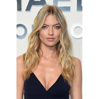 Martha Hunt with a long haircut and allaround layers